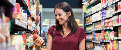A woman shopping in the supermarket